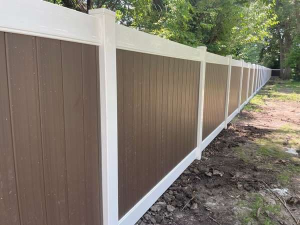 Vinyl privacy fence installed by KB Pipe Fence & Fabrication